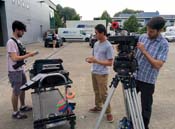 The camera team prep the shooting of an exterior test